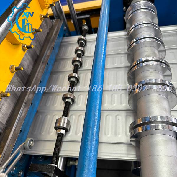 metal deck roll forming machine producing finished steel deck panels