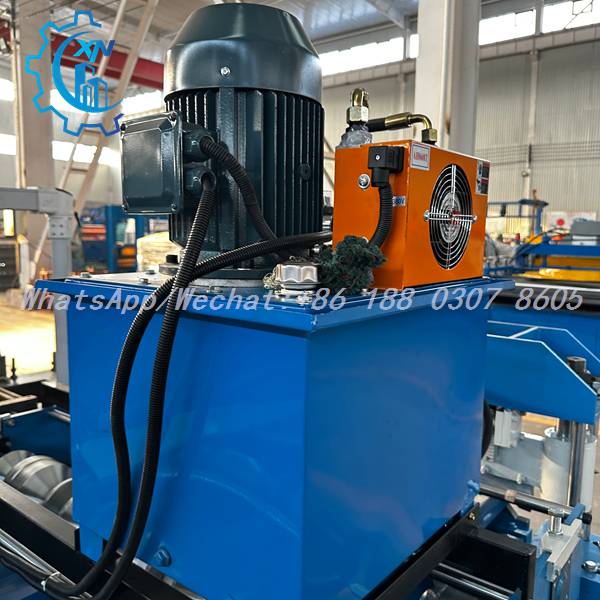 Hydraulic pump station with active air-cooled radiator on XINNUO profile sheet machine — maintains stable oil temperature for continuous trapezoidal roof panel production