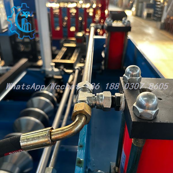 High-pressure braided hydraulic hoses and metal face-seal fittings on a profile sheet making machine — Trapezoidal Roof Panel Forming Machine fluid circuit connectors