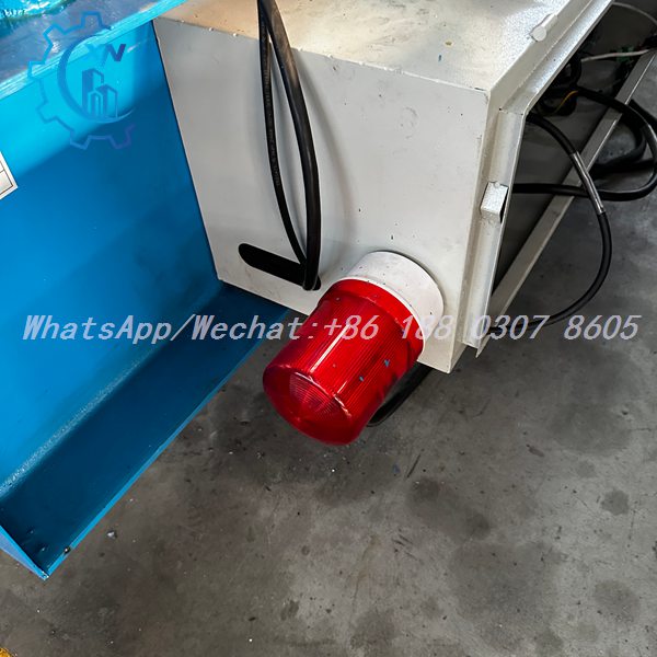 IP54-rated main control cabinet with LED warning beacon on a profile sheet making machine — Trapezoidal Roof Panel Forming Machine electrical enclosure and safety light