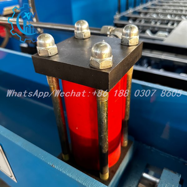 Heavy-duty hydraulic cylinder with chrome-plated piston rod driving the post-cut shear on a profile sheet making machine — Trapezoidal Roof Panel Forming Machine hydraulic station