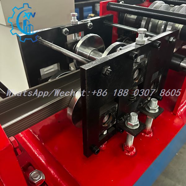 Metal stud being formed by rollers of light steel frame machine