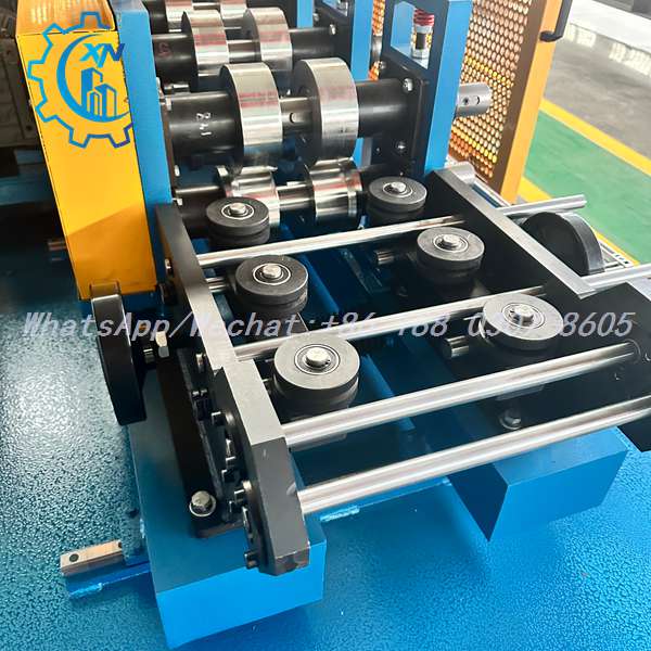 Forming rollers of stud roll forming machine with guide rollers