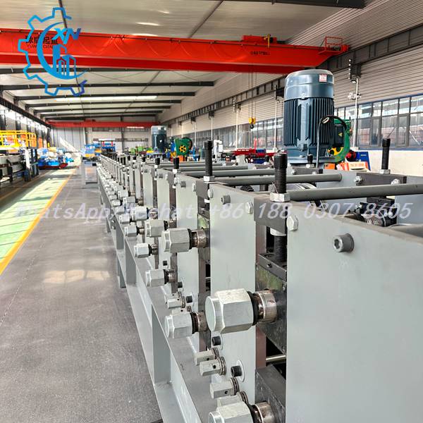 Side view of unistrut roll forming machine with multiple forming stands