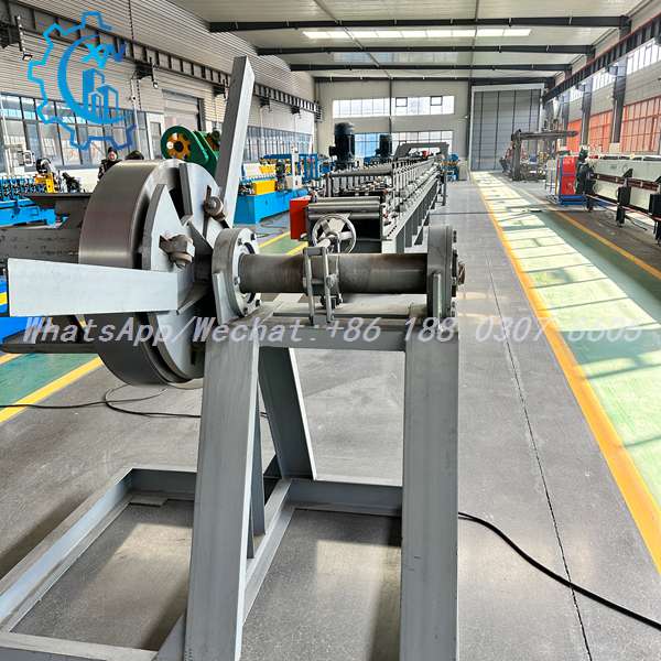 Manual decoiler feeding the unistrut roll forming machine production line