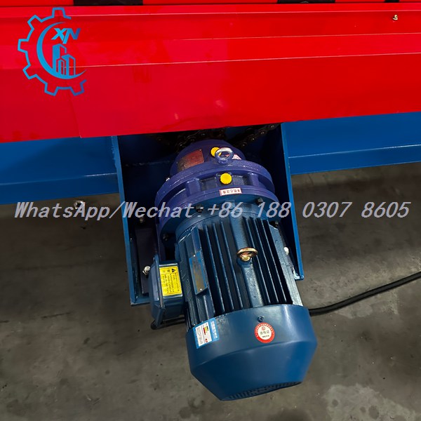 Motor and gearbox with chain drive on steel frame roll forming machine