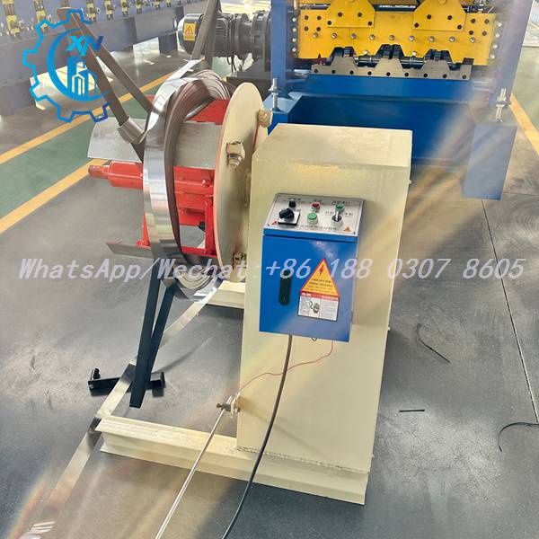 Decoiler feeding coil into stud making machine