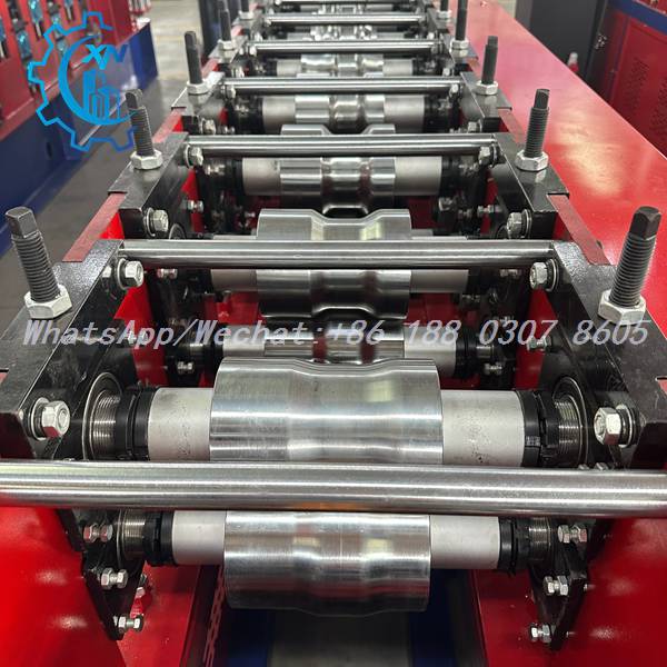 Roller stations with adjustment bolts on automatic rolling shutter machine