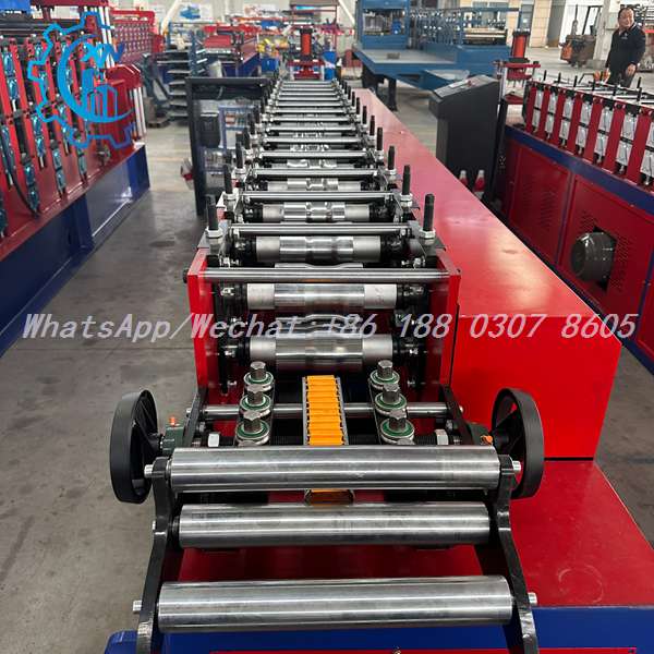 Full line view of shutter rolling machine with handwheels and orange guide