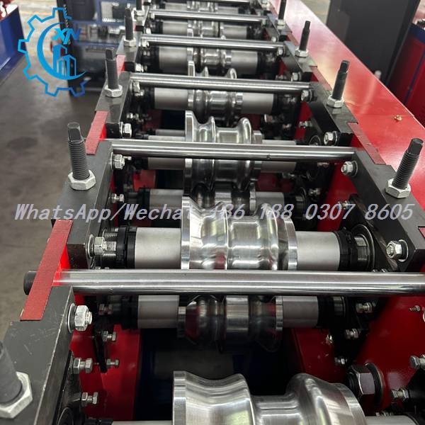 Roller stands with adjustment hardware on shutter rolling machine
