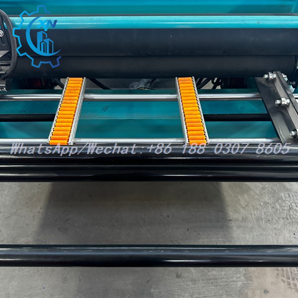 Feed conveyor with orange rollers on IBR machine