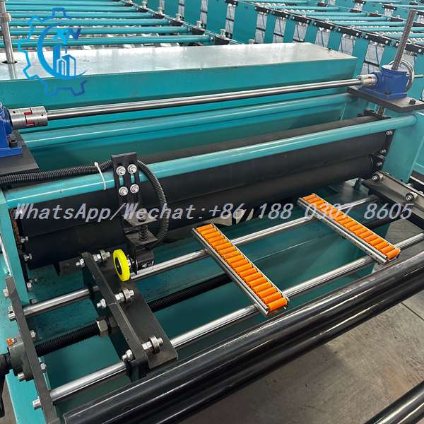 Black rollers with orange guide rollers on IBR roll forming machine