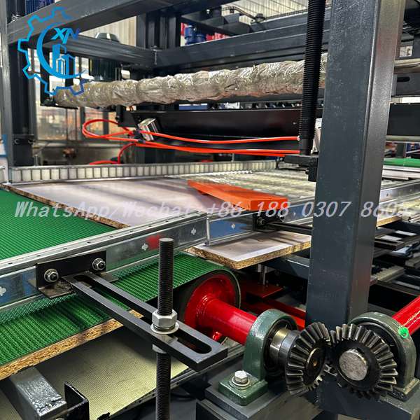 Bevel gears and conveyor belt on eps sandwich panel line