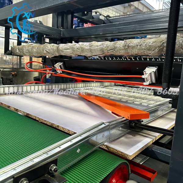 Conveyor belt and pneumatic cylinders on rock wool sandwich panel line