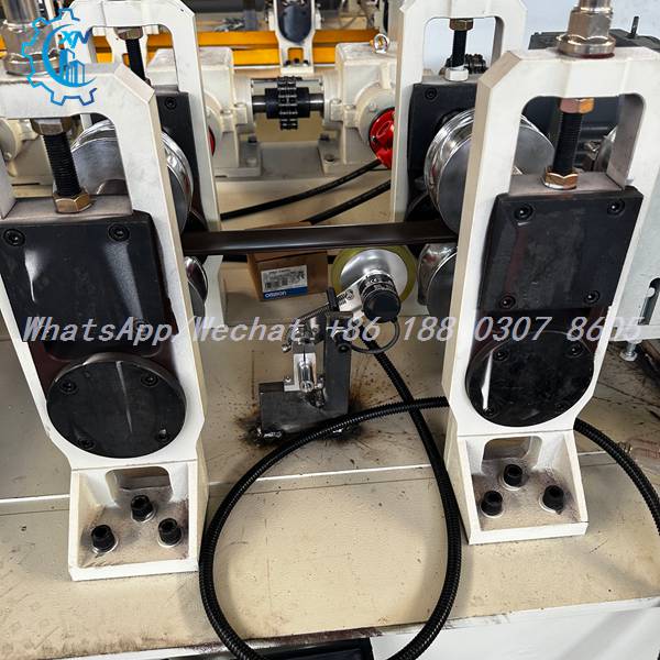 OMRON encoder wheel on PU rolling shutter door roll forming machine