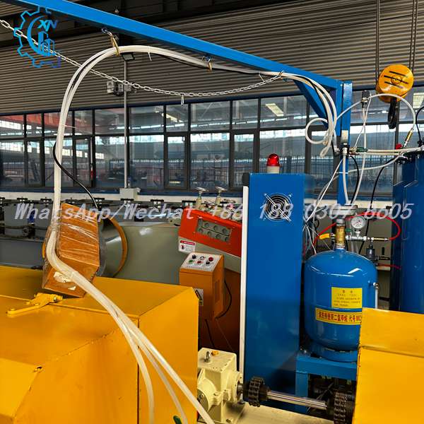 Foam station control panel and tank on shutter door roll forming machine