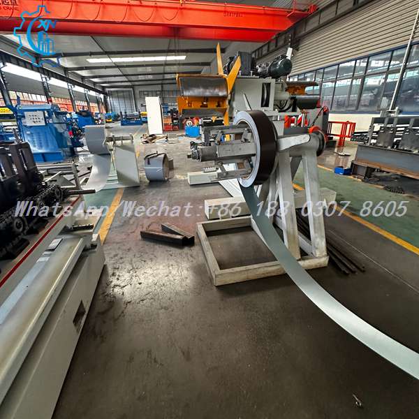Steel coil uncoiler at line entry on shutter door roll forming machine