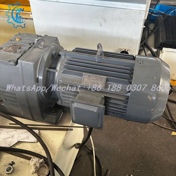 Motor and gearbox drive unit on shutter door roll forming machine