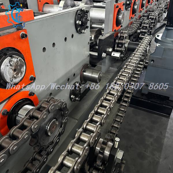 Chain drive and bearing housings on C channel forming machine