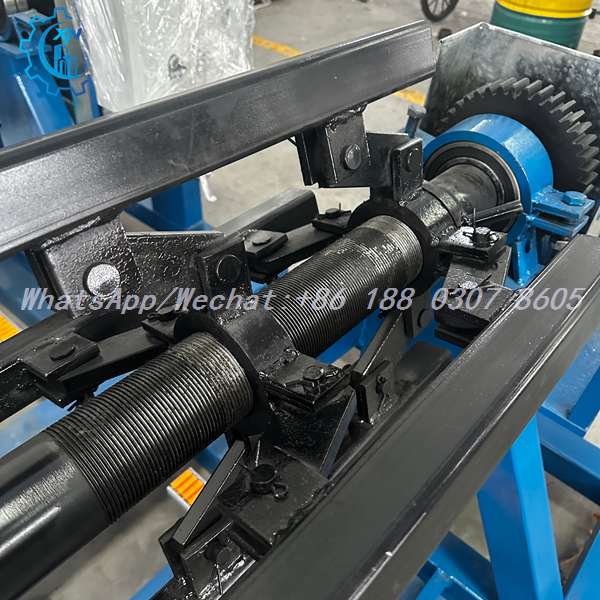Spur gear drive end of decoiler machine mandrel