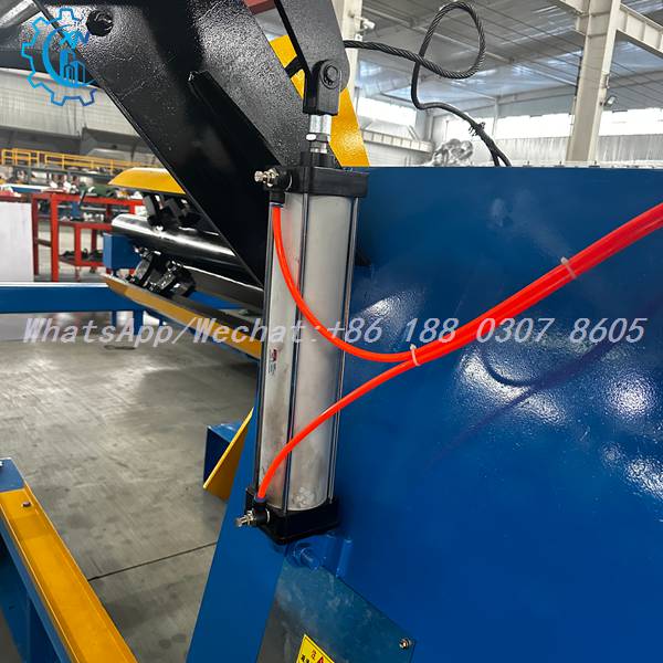 Actuating cylinder and red tubing on hydraulic decoiler machine