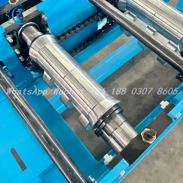 Roller end with jam nuts on semi automatic ridge cap machine